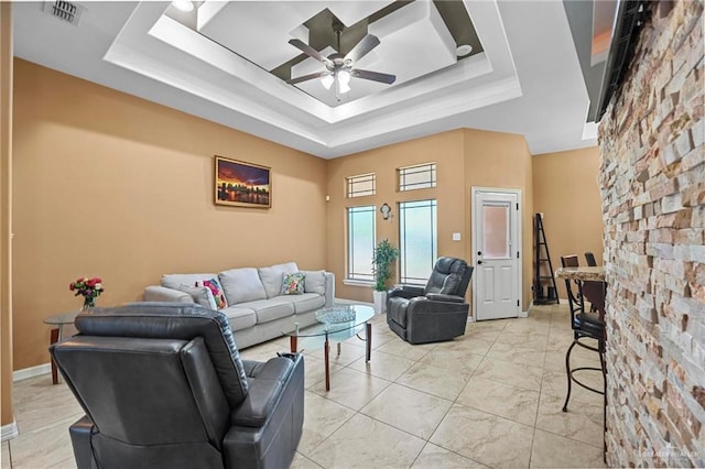 2504 April Ave, Edinburg, TX 78541 - living area with a ceiling fan and a raised ceiling