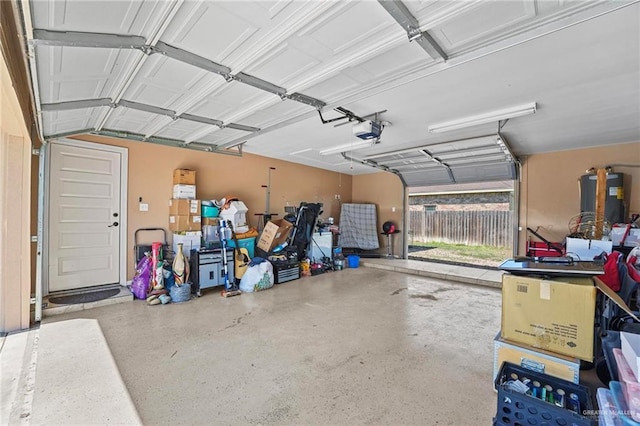 2504 April Ave, Edinburg, TX 78541 - garage with a garage door opener and water heater