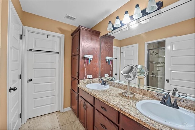 2504 April Ave, Edinburg, TX 78541 - bathroom with double vanity and a stall shower