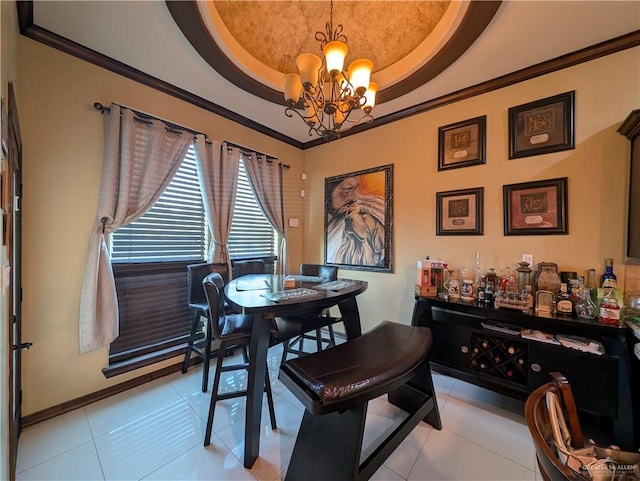 3300 Harding Ave, Alton, TX 78573 - dining room with a raised ceiling, a chandelier, light tile patterned floors, and crown molding
