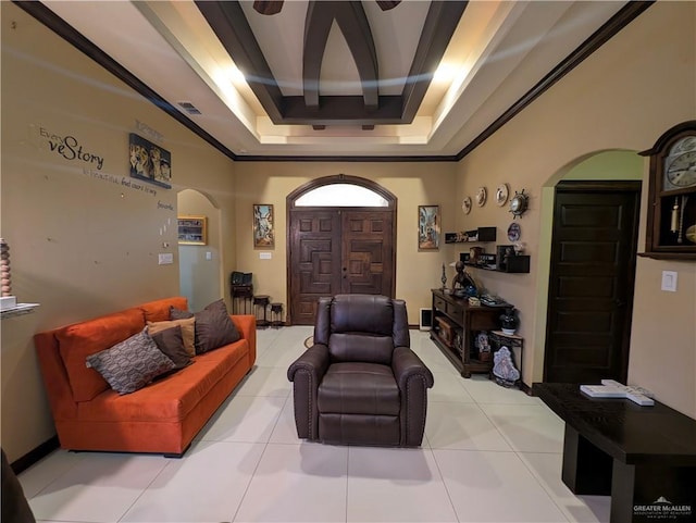3300 Harding Ave, Alton, TX 78573 - living room with arched walkways, a tray ceiling, and light tile patterned floors