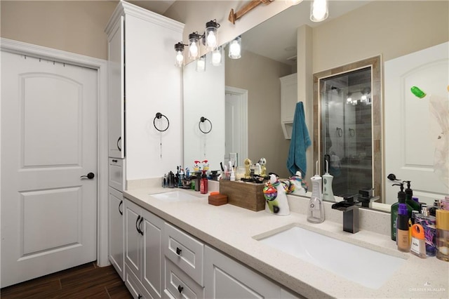 bathroom featuring vanity and walk in shower