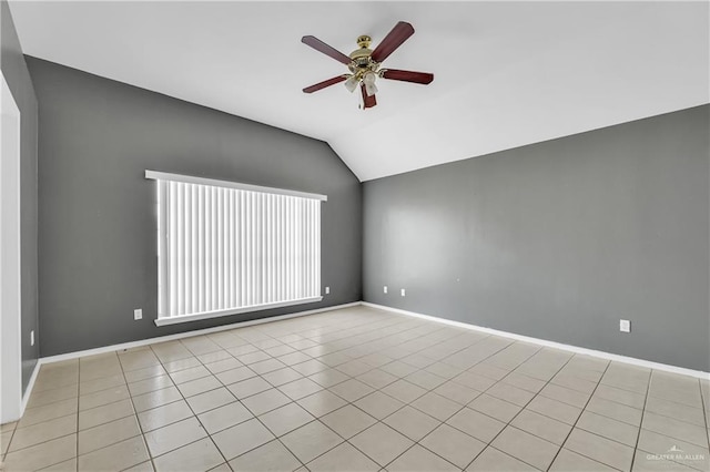 4405 W Ivy Ave, Mcallen, TX 78501 - empty room with ceiling fan, vaulted ceiling, baseboards, and light tile patterned floors