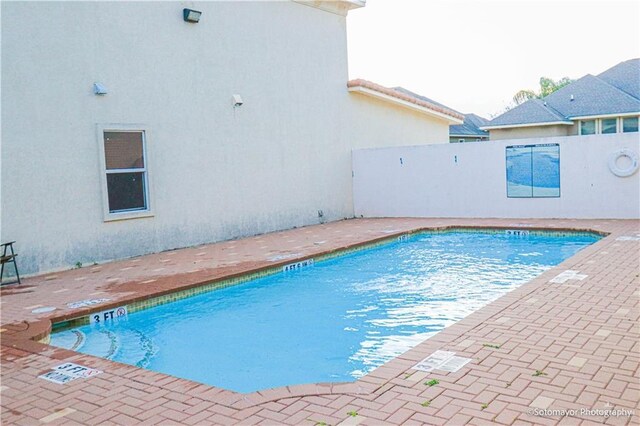 1413 E Keeton Ave Unit 19, Mcallen, TX 78503 - pool with fence and a patio