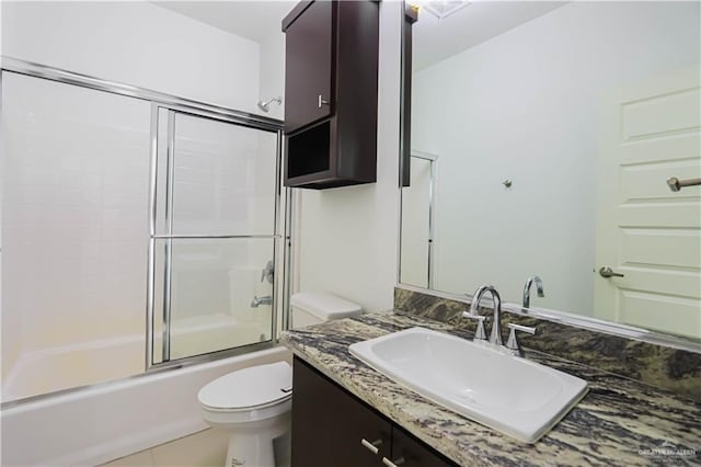 1413 E Keeton Ave Unit 19, Mcallen, TX 78503 - full bath with enclosed tub / shower combo, vanity, and toilet