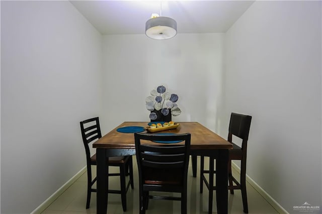 1413 E Keeton Ave Unit 19, Mcallen, TX 78503 - dining space with baseboards