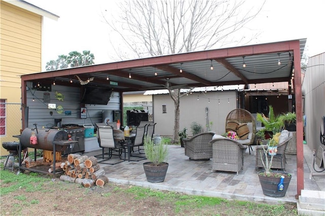 view of patio featuring a grill and an outdoor hangout area