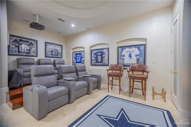 home theater featuring recessed lighting and visible vents