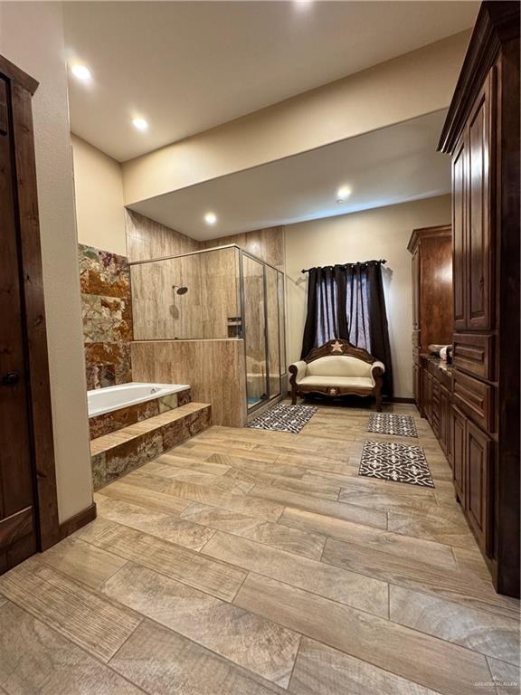 bathroom with plus walk in shower