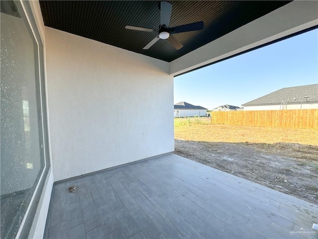 view of patio / terrace featuring ceiling fan and a wooden deck