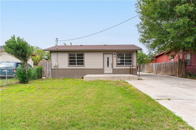 view of front of home with a front yard