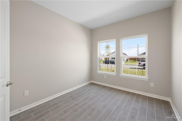 unfurnished room featuring hardwood / wood-style floors