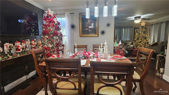 dining room with ceiling fan, wood-type flooring, and ornamental molding