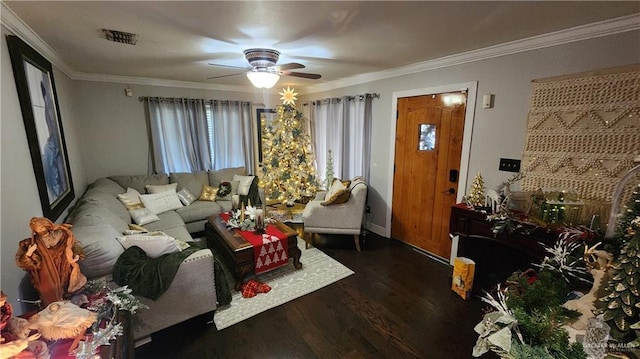 living room featuring ceiling fan, dark hardwood / wood-style flooring, and ornamental molding