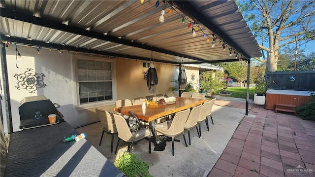 view of patio featuring a hot tub