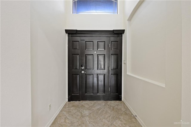 view of tiled foyer entrance