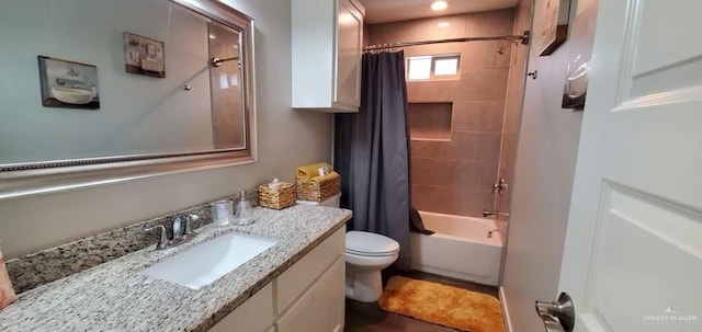 full bathroom with vanity, toilet, and shower / bath combo with shower curtain