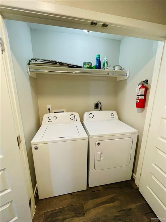 laundry area featuring washer and clothes dryer