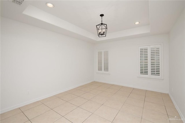 507 Edgewood Ave, Edinburg, TX 78541 - empty room with recessed lighting, an inviting chandelier, visible vents, and a tray ceiling