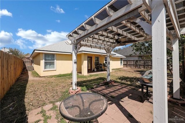 view of patio with a fenced backyard and a pergola