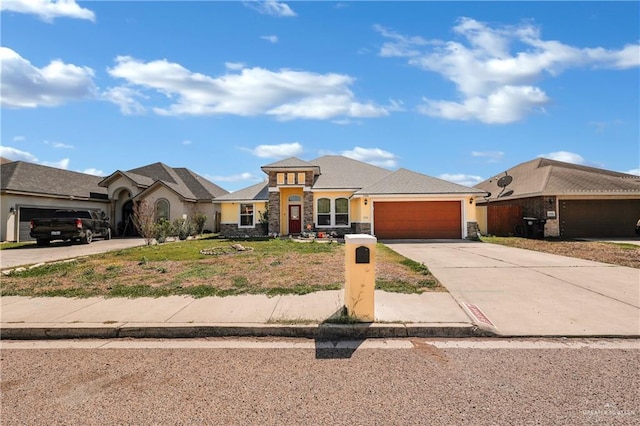 view of front of home featuring concrete driveway, an attached garage, stone siding, and stucco siding