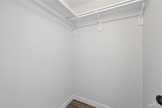 3400 Ozark Ave, Mcallen, TX 78504 - spacious closet featuring dark wood-style floors