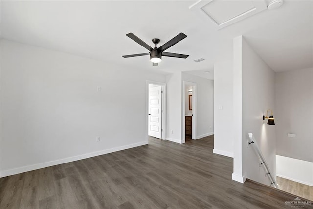 3400 Ozark Ave, Mcallen, TX 78504 - spare room featuring visible vents, baseboards, ceiling fan, dark wood finished floors, and attic access
