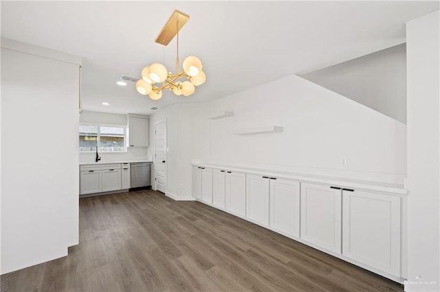 3400 Ozark Ave, Mcallen, TX 78504 - unfurnished dining area with baseboards, a sink, a chandelier, dark wood-style floors, and recessed lighting
