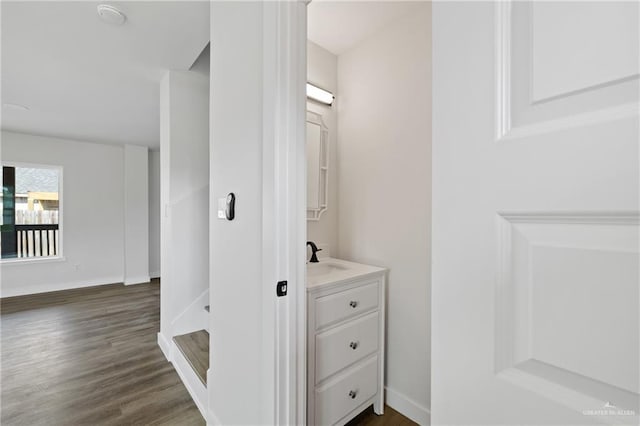 3400 Ozark Ave, Mcallen, TX 78504 - interior space with a sink, baseboards, and dark wood finished floors