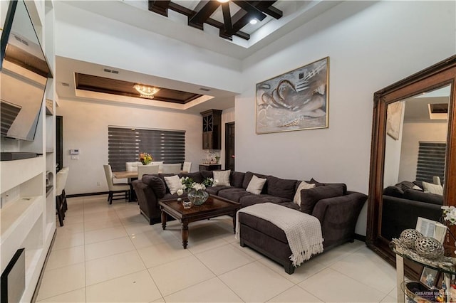 4000 Eucaliptus Ave, Mcallen, TX 78501 - living area with a tray ceiling, light tile patterned floors, beamed ceiling, and coffered ceiling