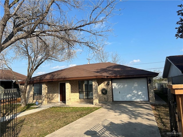 ranch-style house featuring a garage