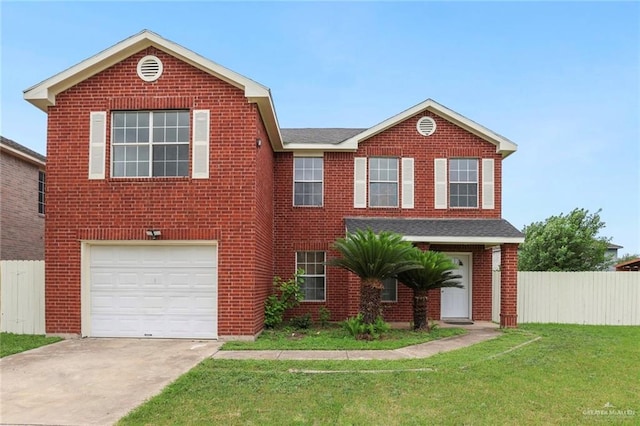 1730 W Jefferson St, Weslaco, TX 78599 - view of front of house with an attached garage, concrete driveway, and brick siding