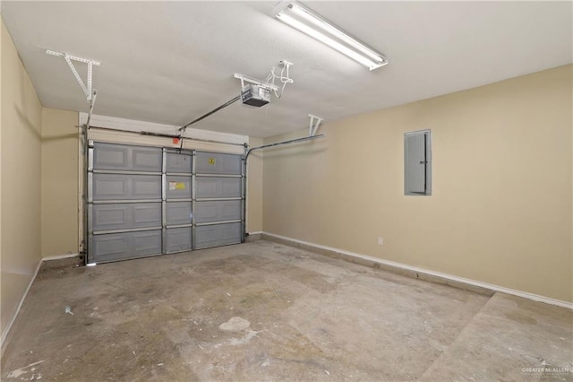 1730 W Jefferson St, Weslaco, TX 78599 - garage with electric panel, baseboards, and a garage door opener