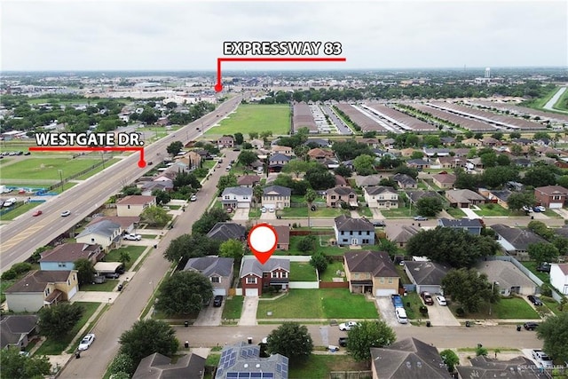 1730 W Jefferson St, Weslaco, TX 78599 - aerial view of property and surrounding area with nearby suburban area
