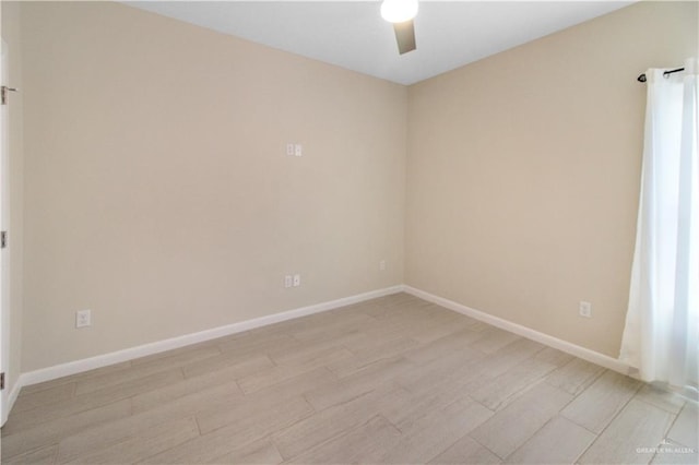3100 E Zinnia Ave, Alton, TX 78573 - empty room with a ceiling fan, light wood-style floors, and baseboards