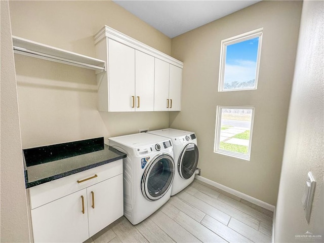 3100 E Zinnia Ave, Alton, TX 78573 - laundry area with cabinet space, washing machine and dryer, and baseboards