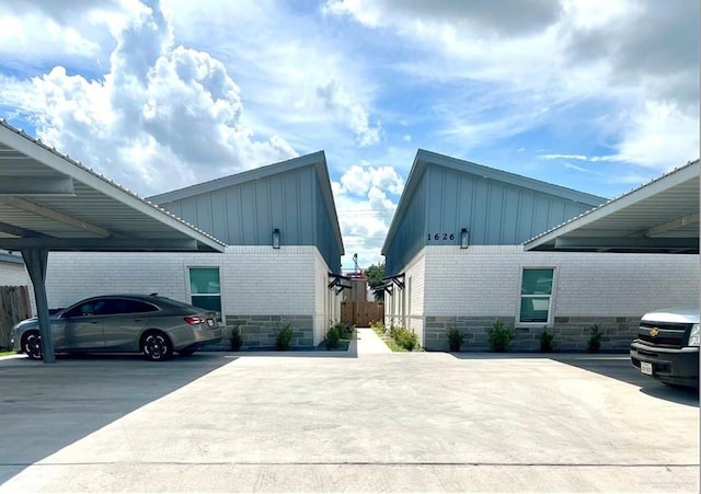 view of home's exterior featuring a carport