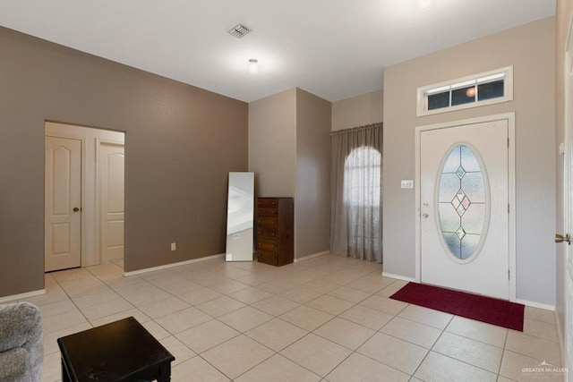 foyer with light tile patterned floors