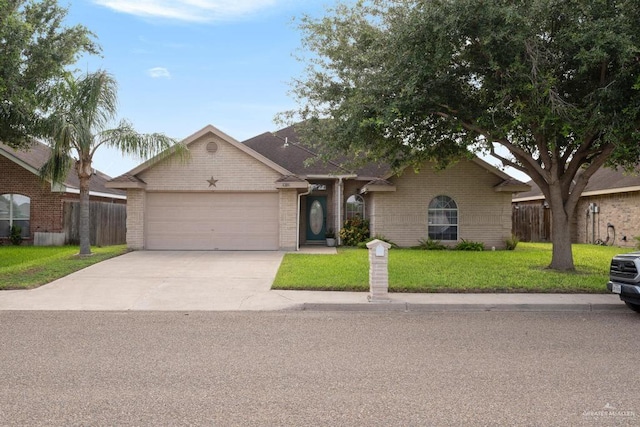 ranch-style home featuring a front yard and a garage