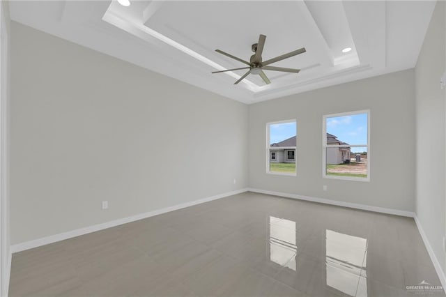 1015 Magnolia St, Mission, TX 78573 - unfurnished room featuring a raised ceiling, ceiling fan, recessed lighting, and baseboards