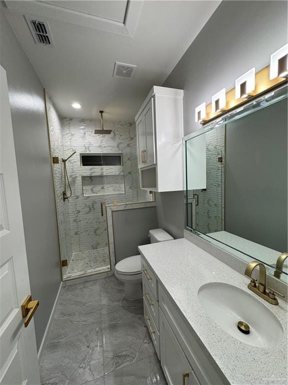 bathroom featuring vanity, toilet, and walk in shower