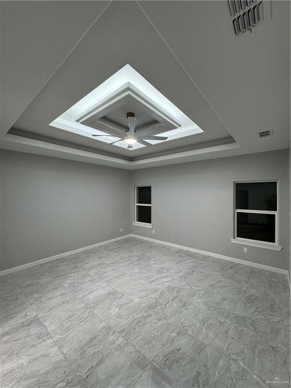 additional living space with built in features and ceiling fan