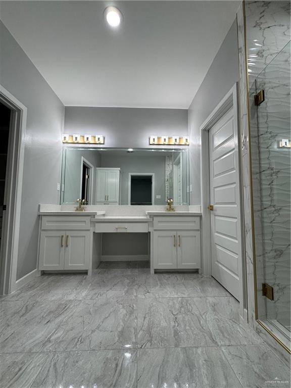 bathroom with vanity and walk in shower