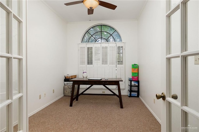 home office featuring light carpet, french doors, ceiling fan, and ornamental molding