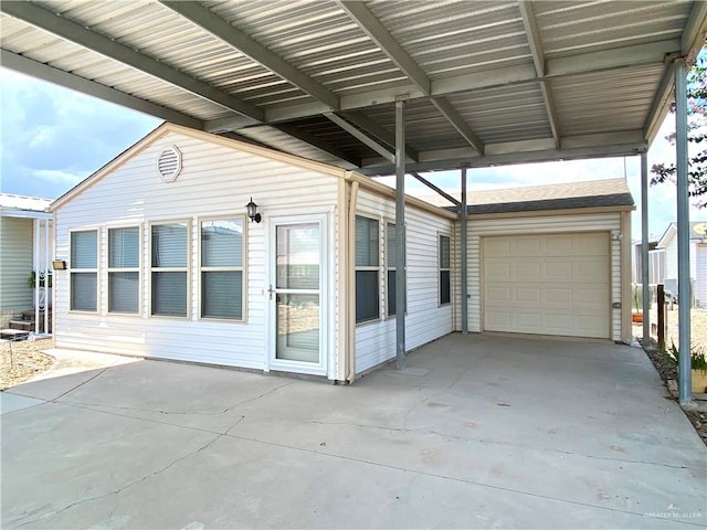 exterior space with a carport