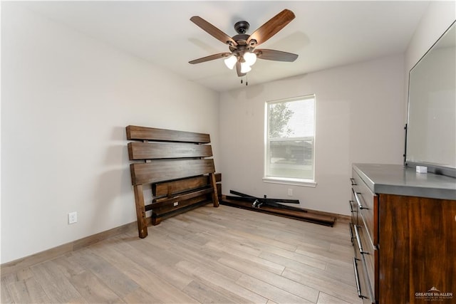 interior space featuring ceiling fan and light wood-type flooring