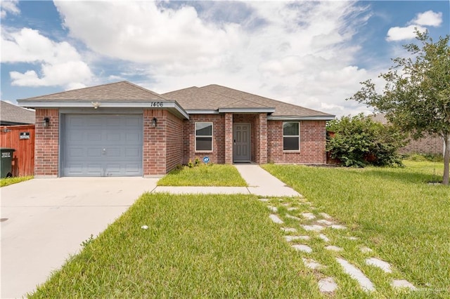 ranch-style home with a front yard and a garage