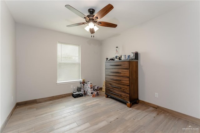 miscellaneous room featuring ceiling fan and light wood-type flooring