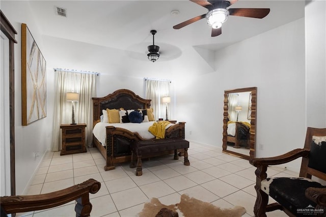 bedroom featuring ceiling fan and light tile patterned flooring