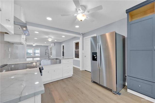 517 E Jones Ave, Pharr, TX 78577 - kitchen featuring stainless steel fridge with ice dispenser, ceiling fan, white cabinets, recessed lighting, and light wood-type flooring